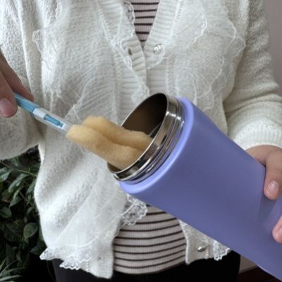 How can we clean the inner lining of a vacuum flask properly to avoid unpleasant odors?